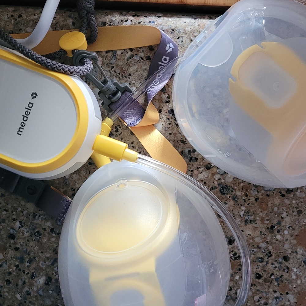 Medela Breast Pump Parts in Yellow and White